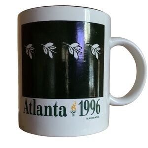 1996 Atlanta Centennial Olympics coffee mug with gold rim and leaf print